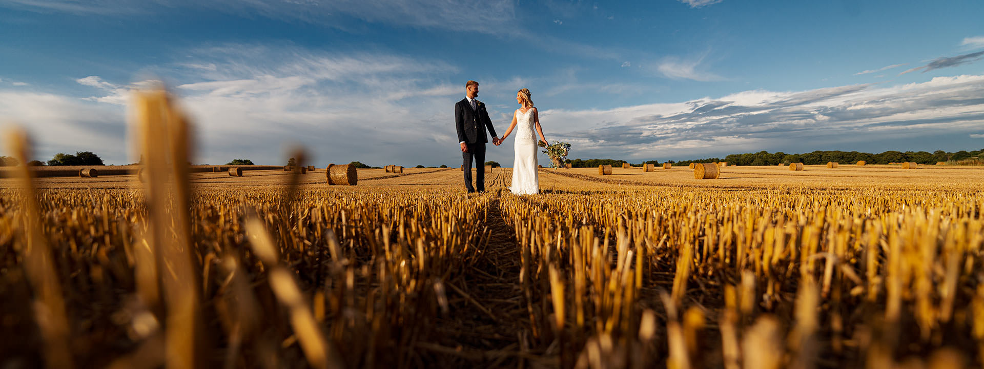 Swancar Farm bride and groom in field